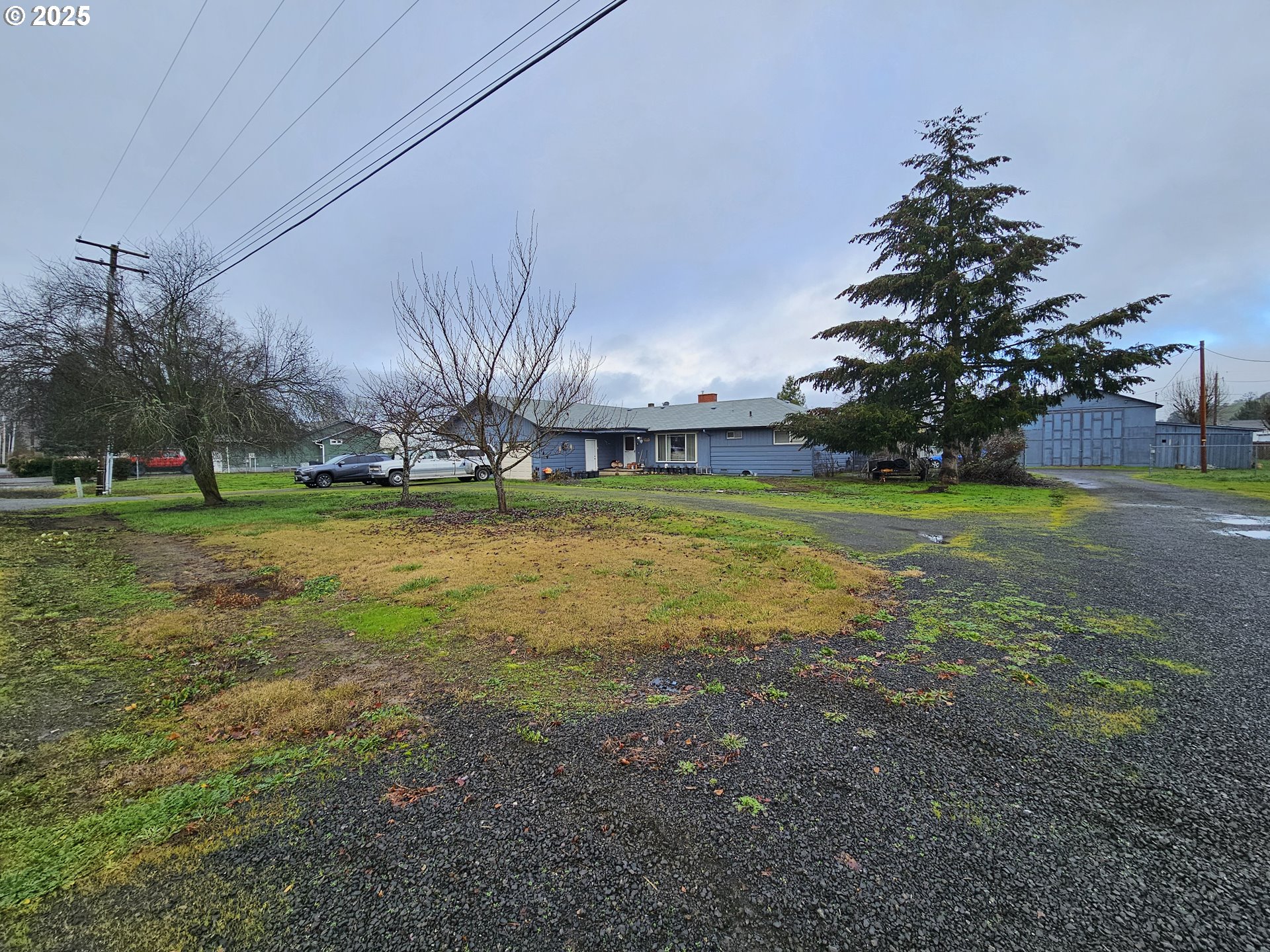 2462 Austin Road Roseburg, OR 97471 - Photo 5 of 36 a view of a big yard with a fountain