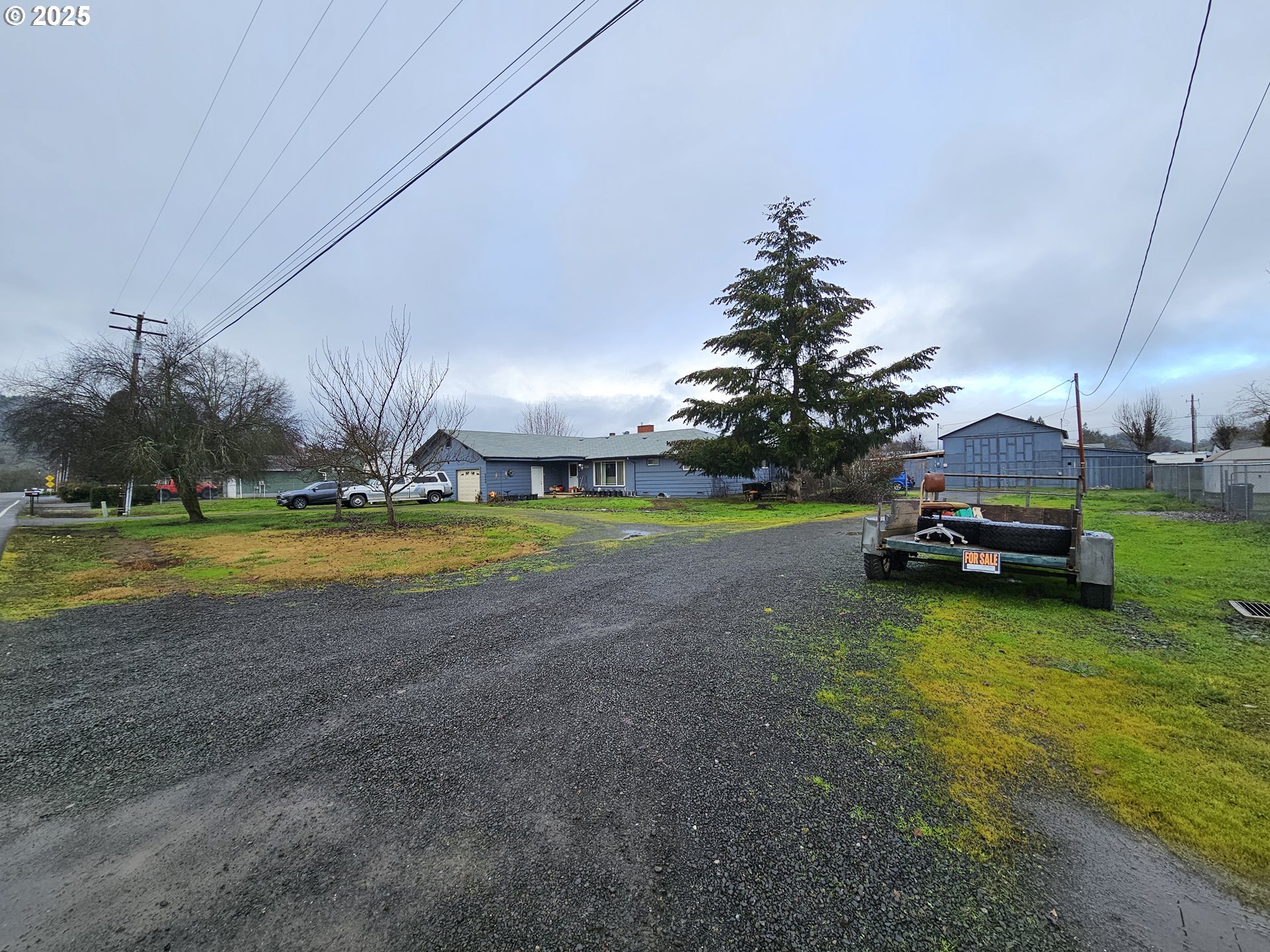 2462 Austin Road Roseburg, OR 97471 - Photo 6 of 36 a view of yard with swimming pool and green space