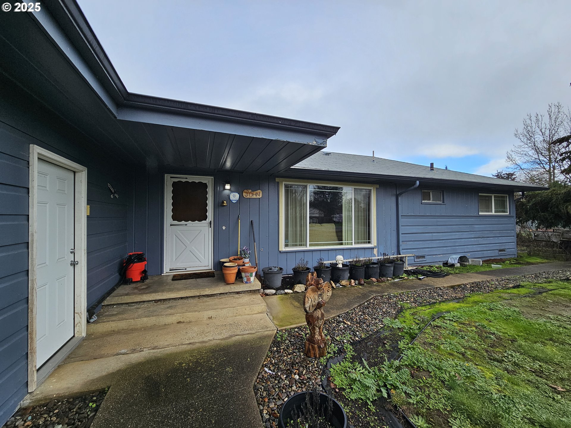 2462 Austin Road Roseburg, OR 97471 - Photo 10 of 36 a front view of a house with a yard