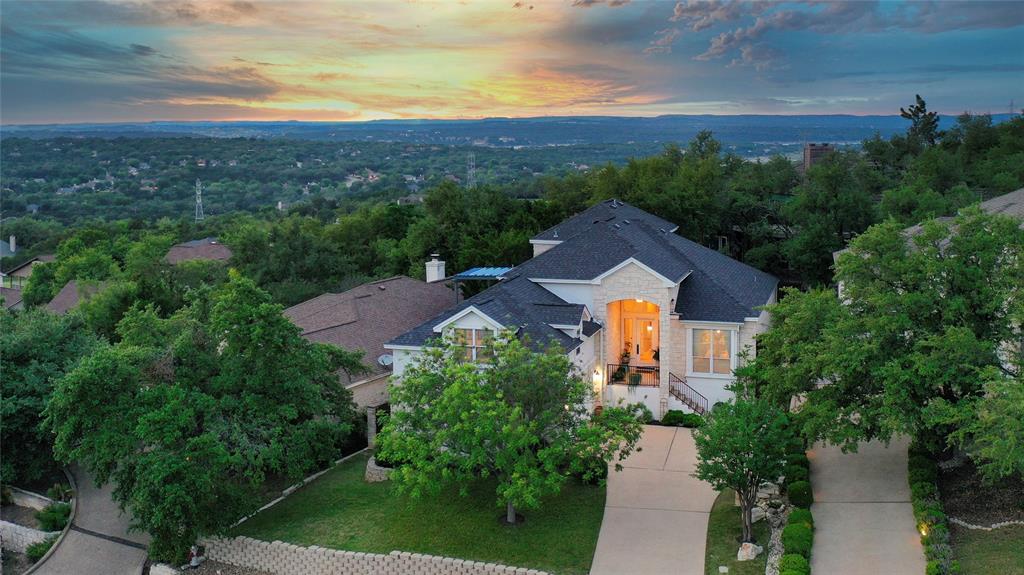 216 Hazeltine Drive Lakeway, TX 78734 - Photo 1 of 38 an aerial view of a house
