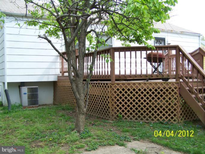 8704 Geren Road Silver Spring, MD 20901 - Photo 3 of 15 a front view of a house with a garden