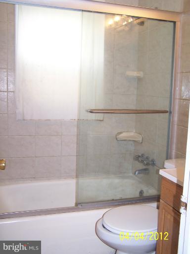 8704 Geren Road Silver Spring, MD 20901 - Photo 8 of 15 a bathroom with a shower