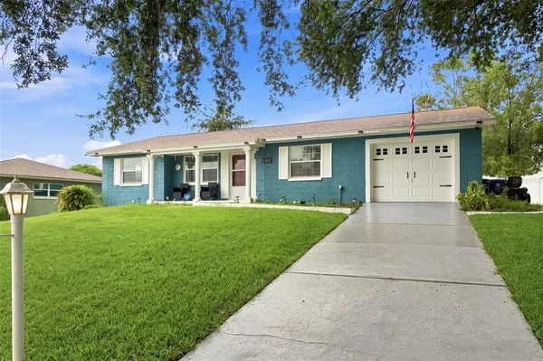 front view of a house with a yard