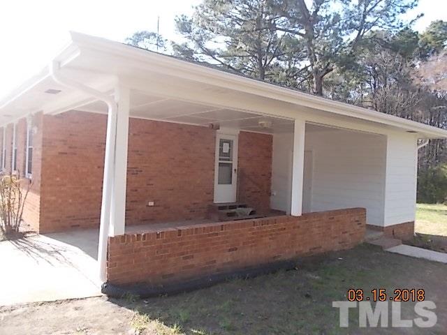 3933 Buffaloe Road Raleigh, NC 27604 - Photo 2 of 16 a view of a back yard of the house