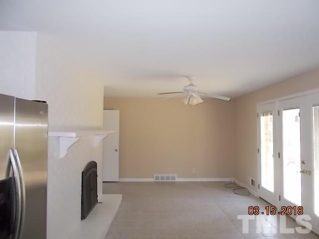 3933 Buffaloe Road Raleigh, NC 27604 - Photo 5 of 16 a view of an empty room