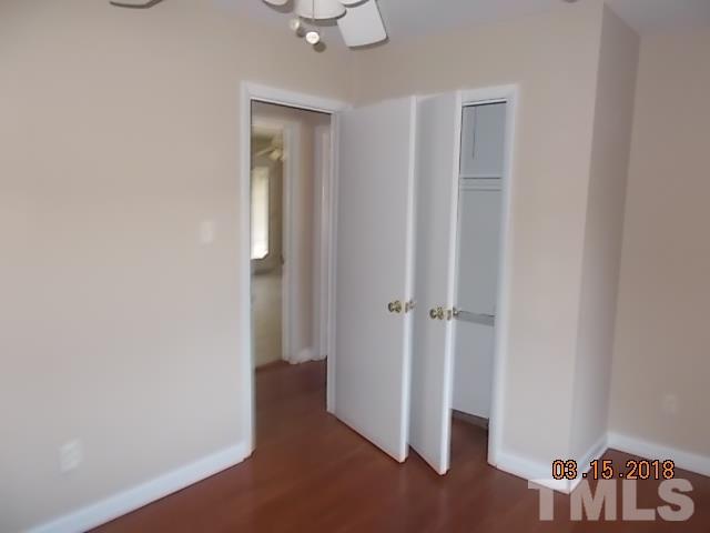 3933 Buffaloe Road Raleigh, NC 27604 - Photo 9 of 16 a view of a room with wooden floor