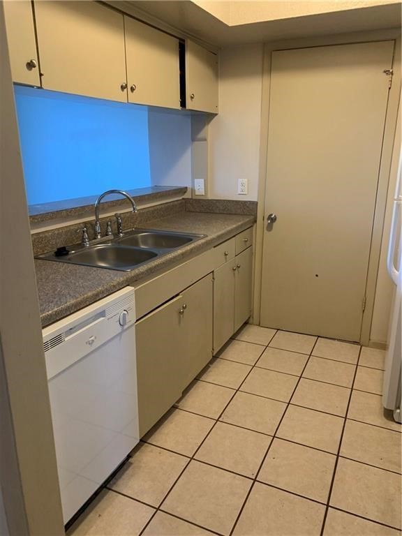a kitchen with a sink cabinets and utility