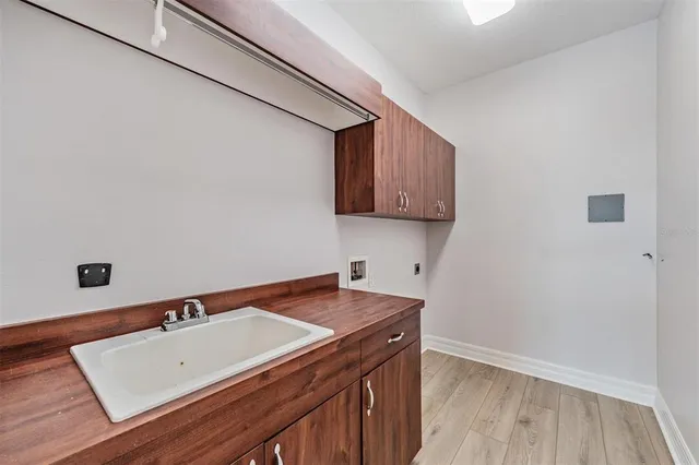 a picture of a cabinet with a white wall