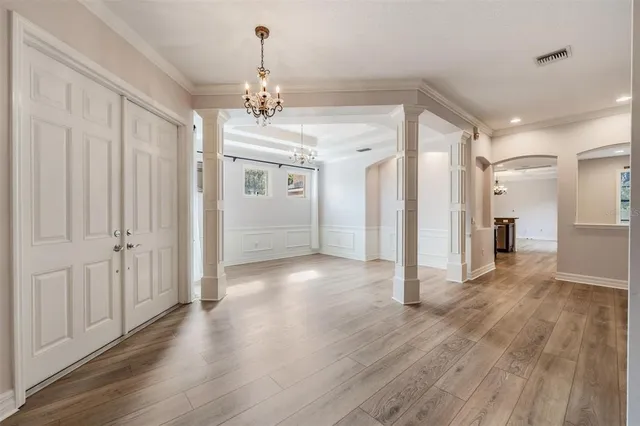 a living room with furniture flat screen tv and a fireplace