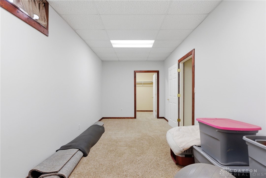 1540 Jasper Road Xenia, OH 45385 - Photo 56 of 91 This spacious interior room offers versatile potential for various uses, with ample floor space and a bright, functional aesthetic.