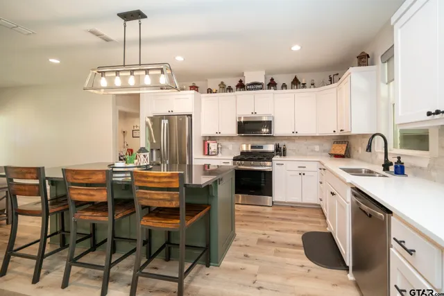 a house with yard in front of it