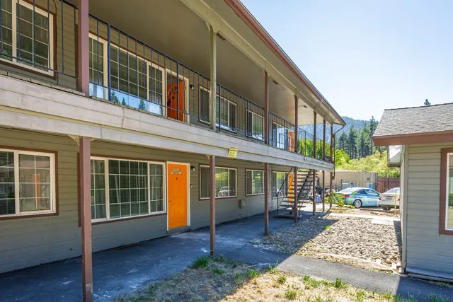 a view of front a house with large windows