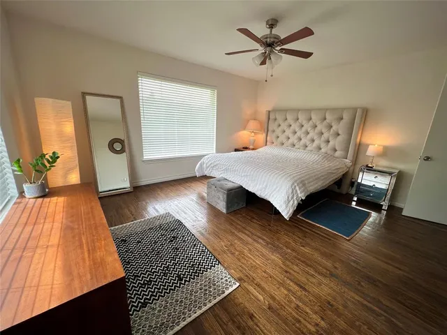 a living room with furniture rug and window