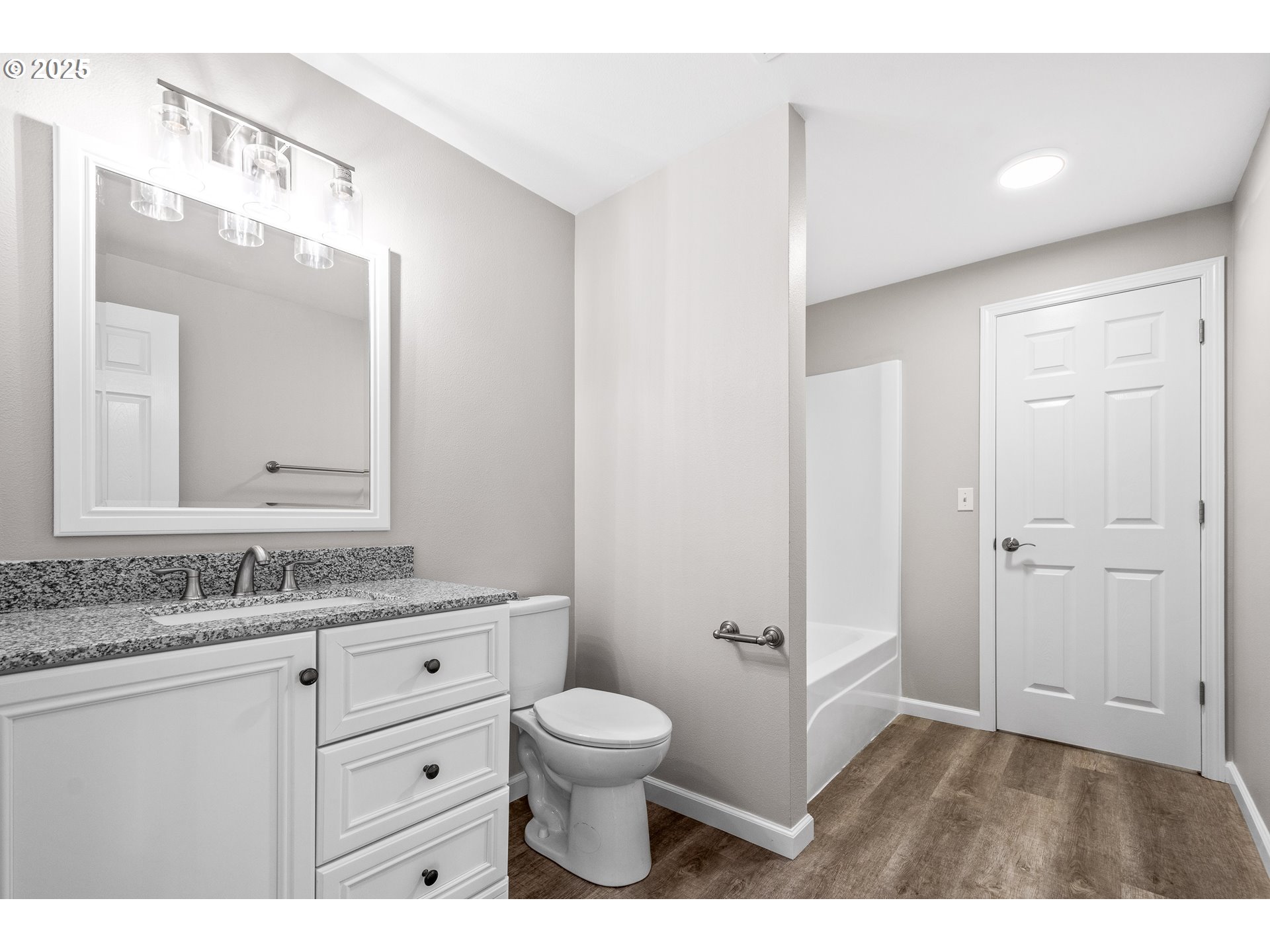 31030 Southwest Unger Road Cornelius, OR 97113 - Photo 23 of 25 a bathroom with a granite countertop sink a toilet and a mirror