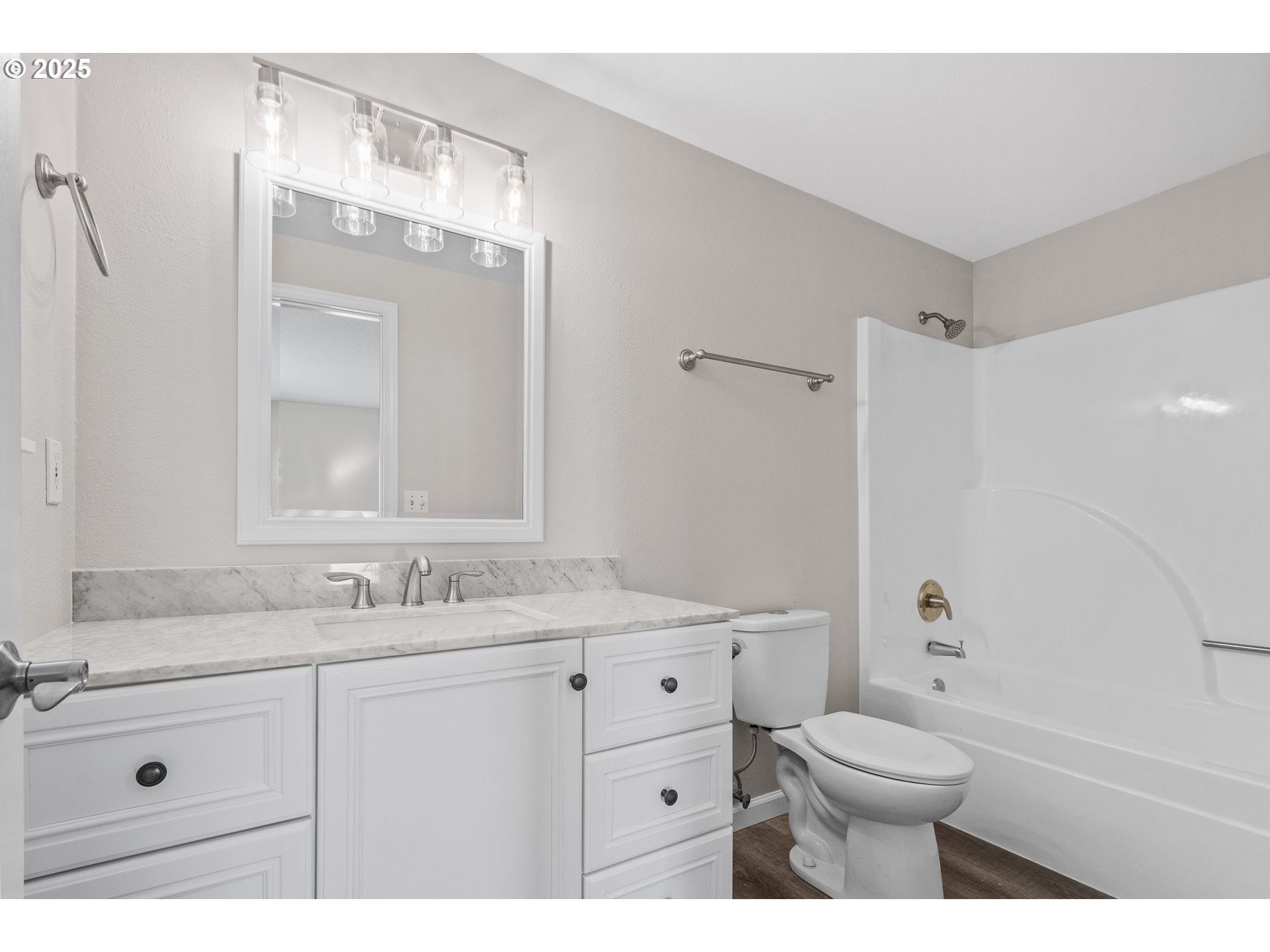 31030 Southwest Unger Road Cornelius, OR 97113 - Photo 24 of 25 a bathroom with a granite countertop sink toilet a large mirror a bathtub and shower