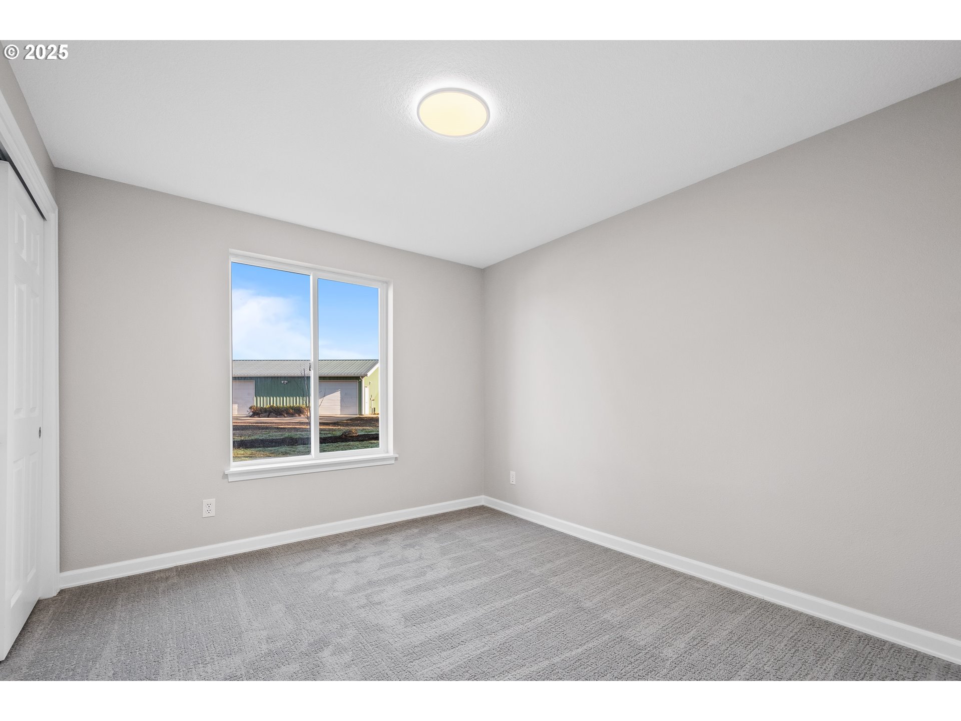 31030 Southwest Unger Road Cornelius, OR 97113 - Photo 5 of 25 a view of an empty room with a window