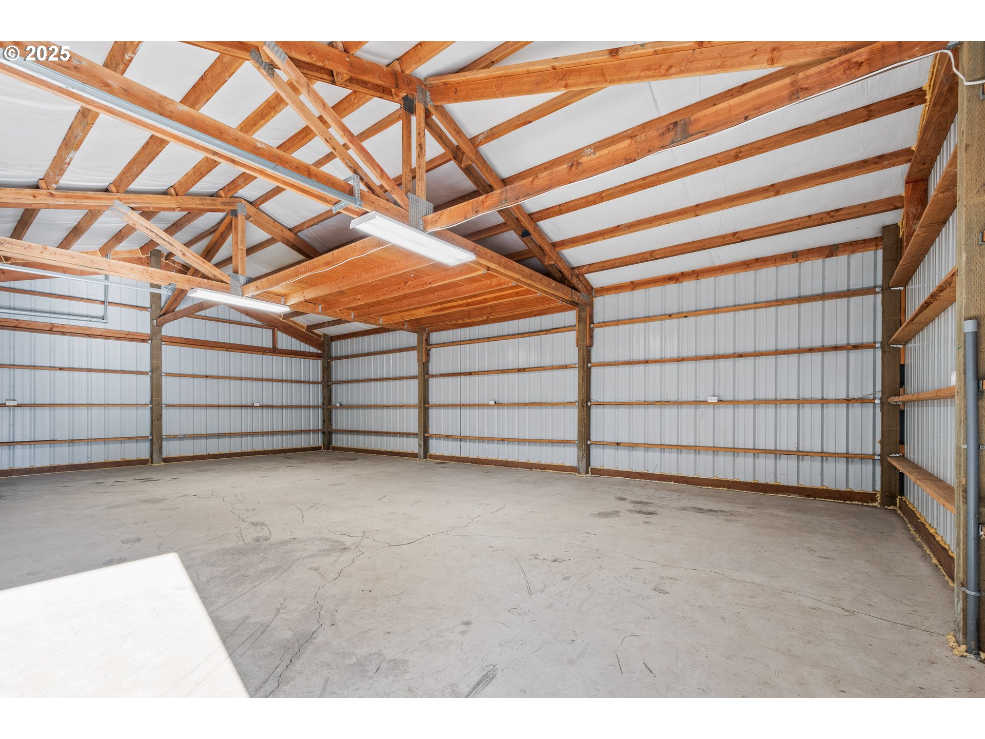 31030 Southwest Unger Road Cornelius, OR 97113 - Photo 10 of 25 a view of a room with racks on the wall
