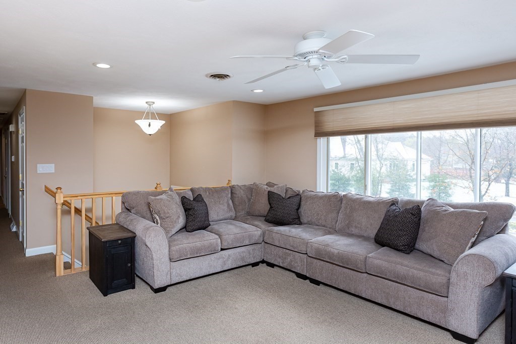 5 Williams Road Sharon, MA 02067 - Photo 3 of 34 a living room with furniture and a large window