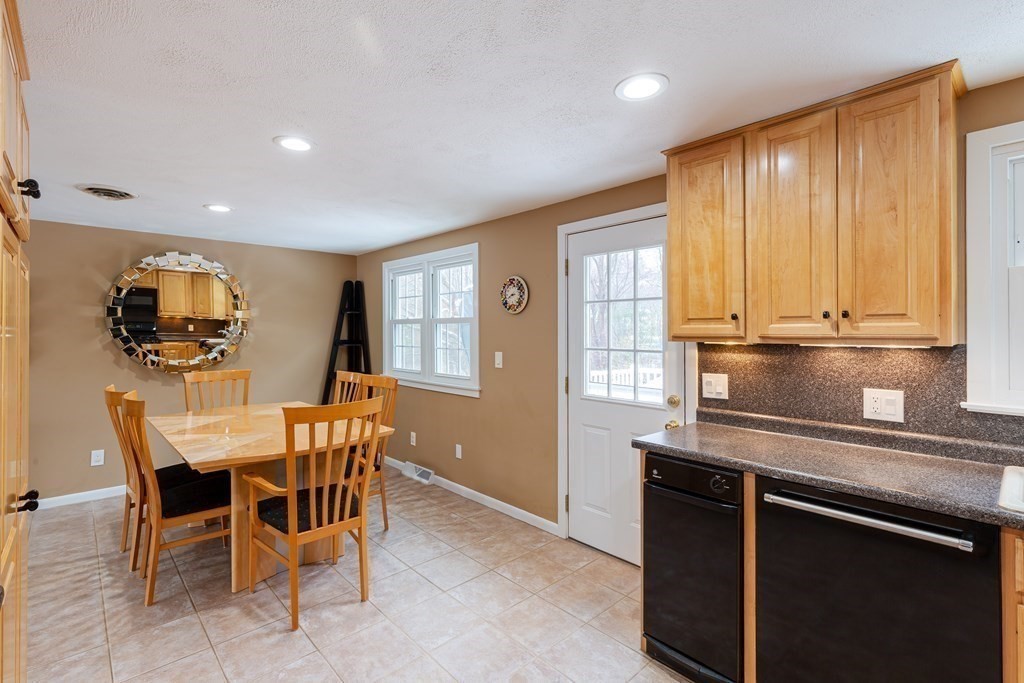 5 Williams Road Sharon, MA 02067 - Photo 7 of 34 a view of a dining room with furniture and window