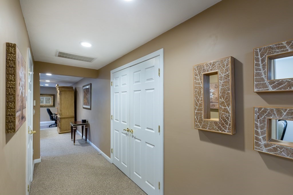 5 Williams Road Sharon, MA 02067 - Photo 10 of 34 a view of a hallway with seating area