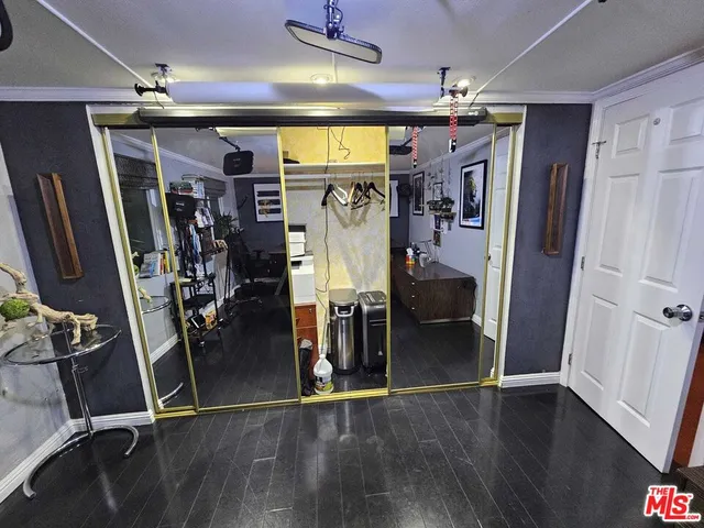 a room with furniture workspace and a window