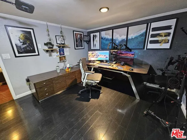 a view of a livingroom with furniture and a table