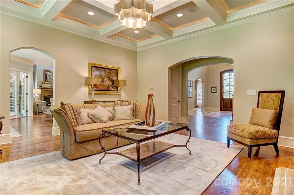 4701 Piper Glen Drive Charlotte, NC 28277 - Photo 8 of 47 a living room with furniture and a mirror