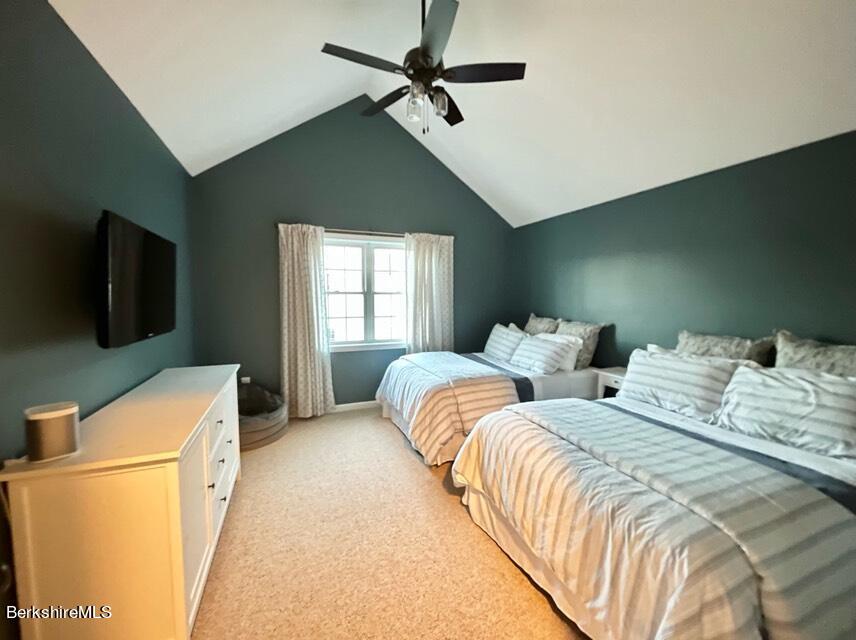 9212 Mountainside Drive Hancock, MA 01237 - Photo 19 of 44 a bedroom with two beds and a flat screen tv