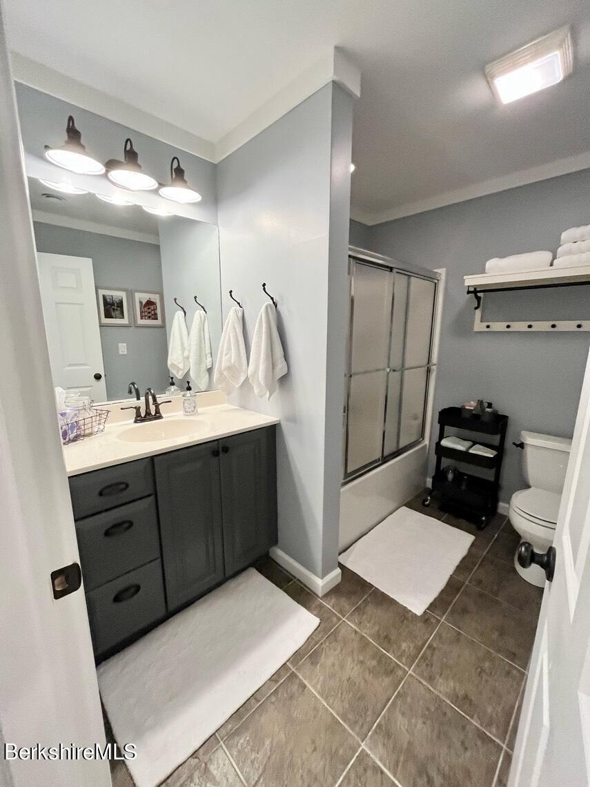 9212 Mountainside Drive Hancock, MA 01237 - Photo 35 of 44 a bathroom with a sink toilet and shower