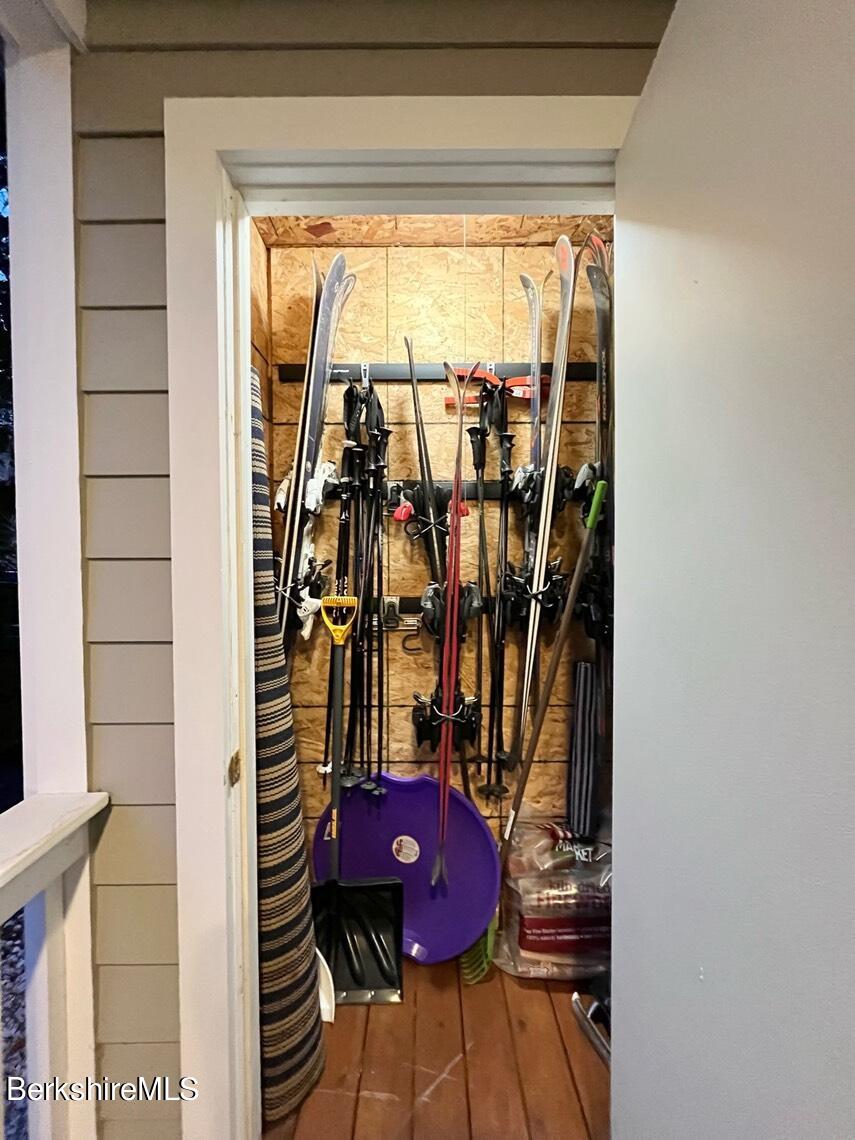 9212 Mountainside Drive Hancock, MA 01237 - Photo 44 of 44 a view of a room with wooden shelves