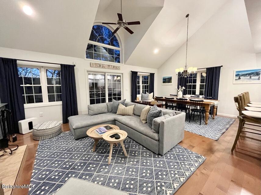 9212 Mountainside Drive Hancock, MA 01237 - Photo 7 of 44 a living room with furniture fireplace and flat screen tv