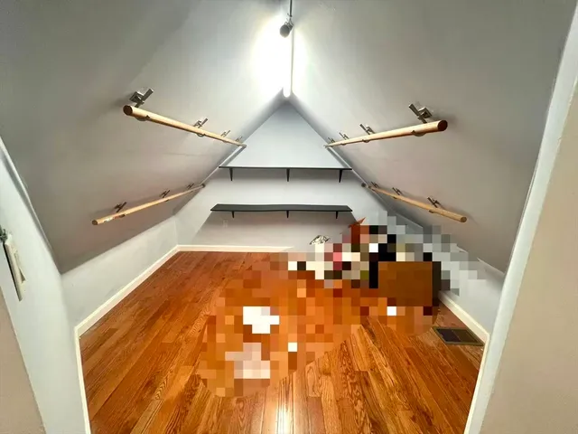 a view of entryway with wooden floor