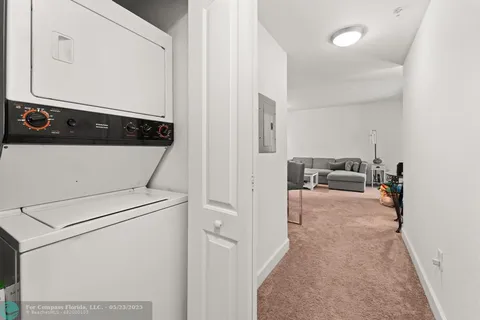 a view of living room washer and dryer