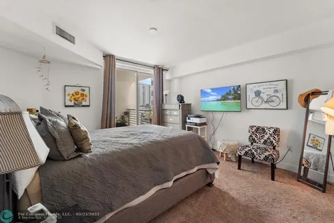 a bedroom with a bed and furniture