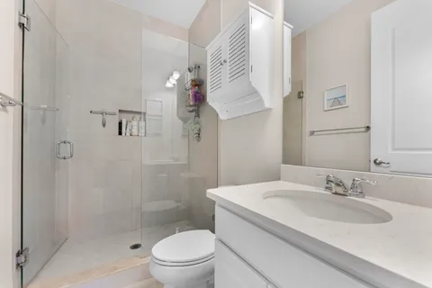 a front view of a house with a yard garage and outdoor seating