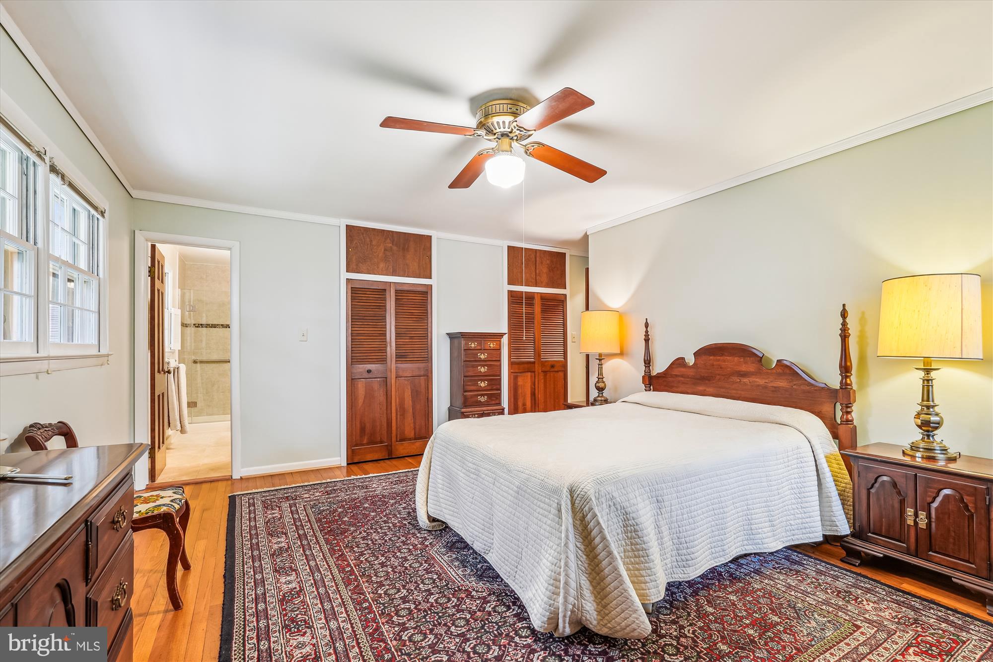 16523 Kipling Road Rockville, MD 20855 - Photo 19 of 50 a bedroom with a bed and wooden floor