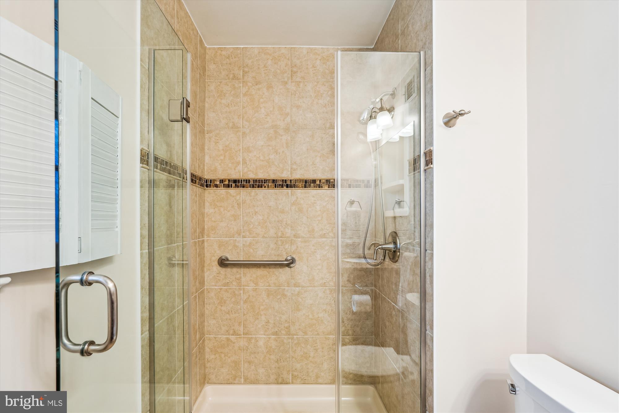 16523 Kipling Road Rockville, MD 20855 - Photo 20 of 50 a bathroom with a shower