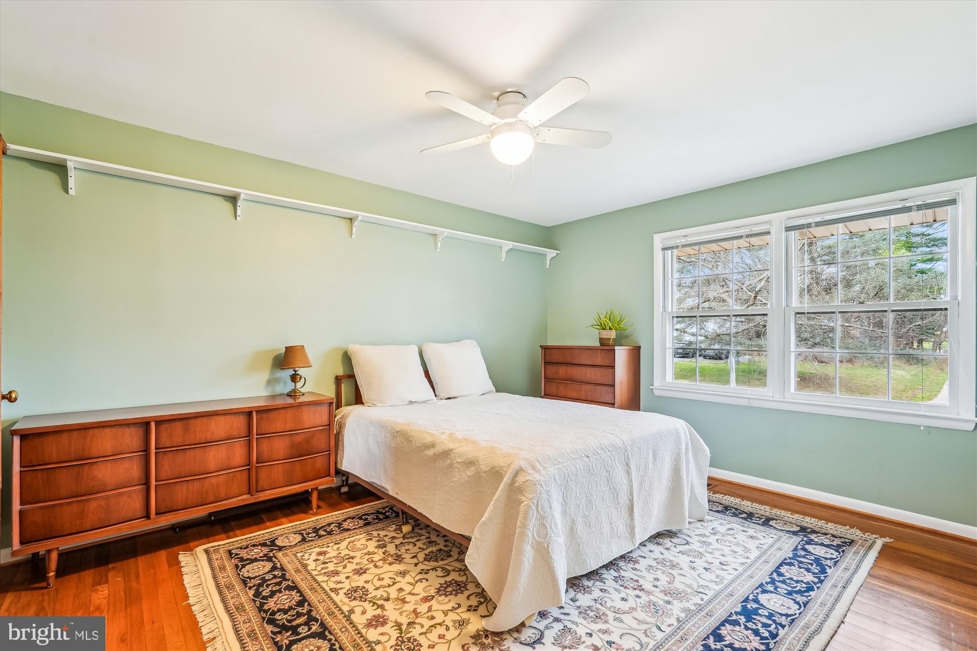 16523 Kipling Road Rockville, MD 20855 - Photo 22 of 50 a bedroom with a large bed and a window