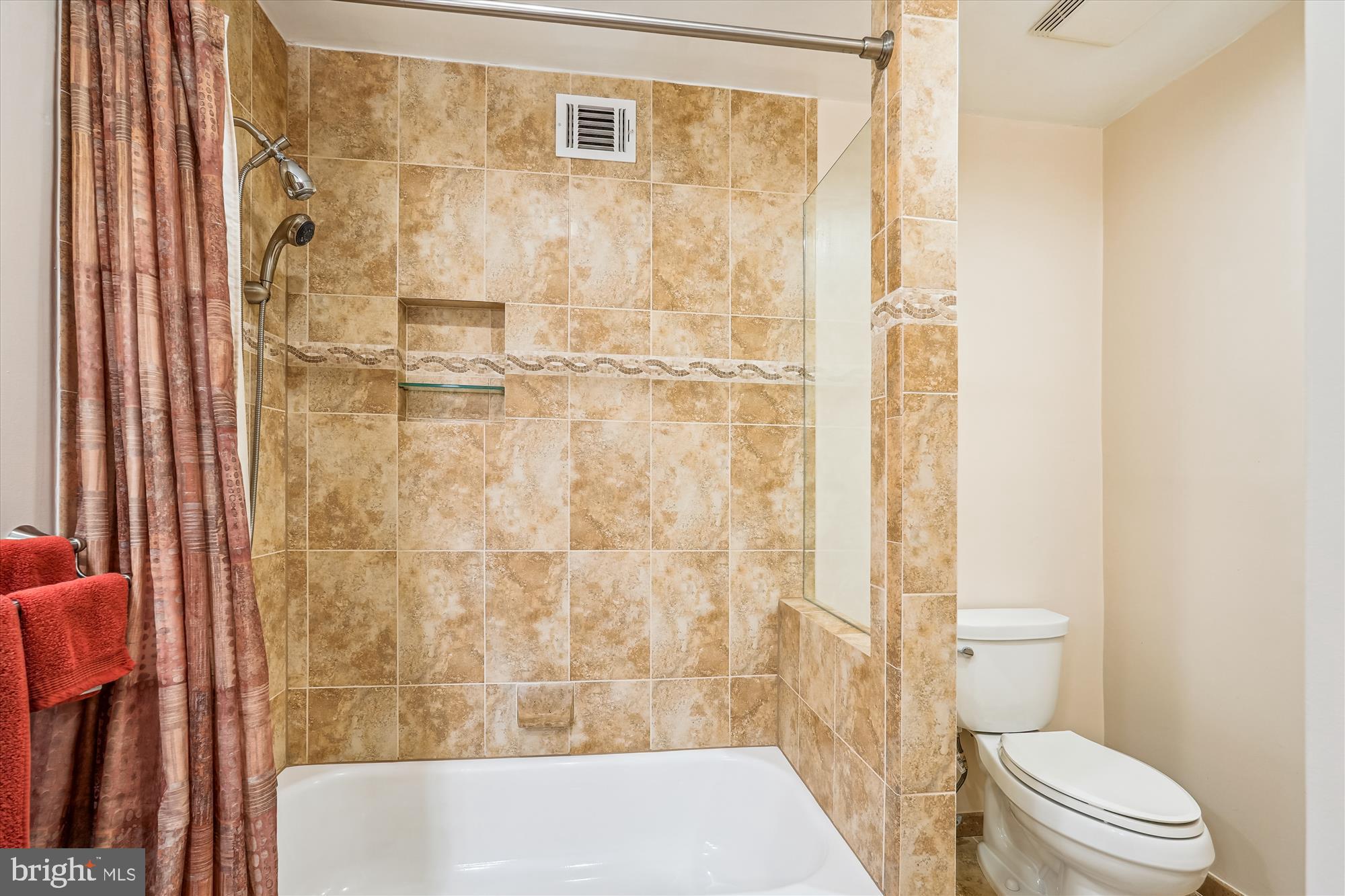 16523 Kipling Road Rockville, MD 20855 - Photo 26 of 50 a bathroom with a toilet and shower