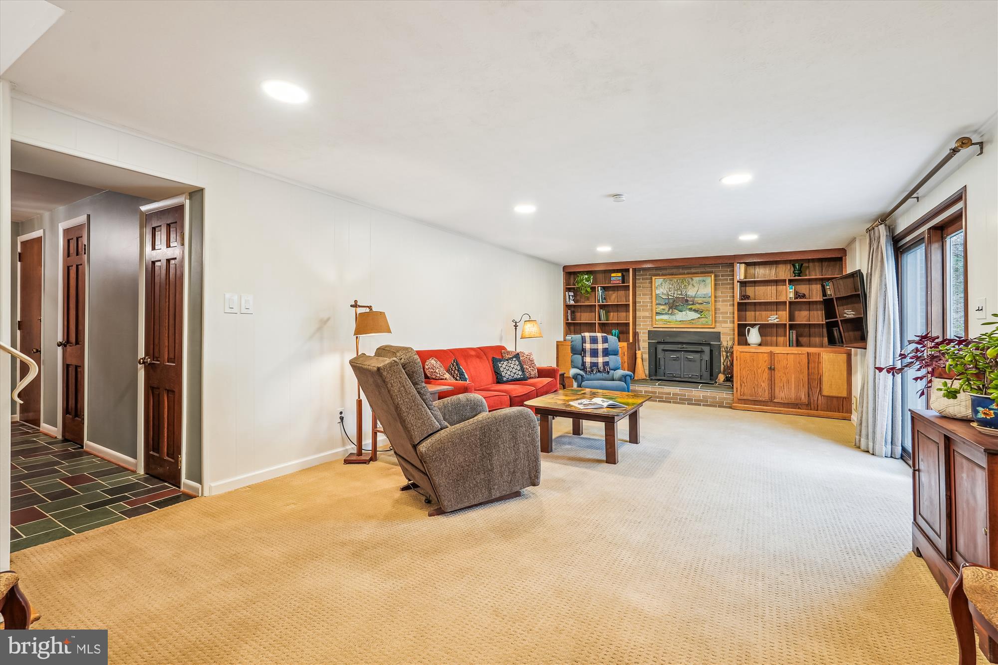 16523 Kipling Road Rockville, MD 20855 - Photo 32 of 50 a view of a livingroom with furniture and a potted plant