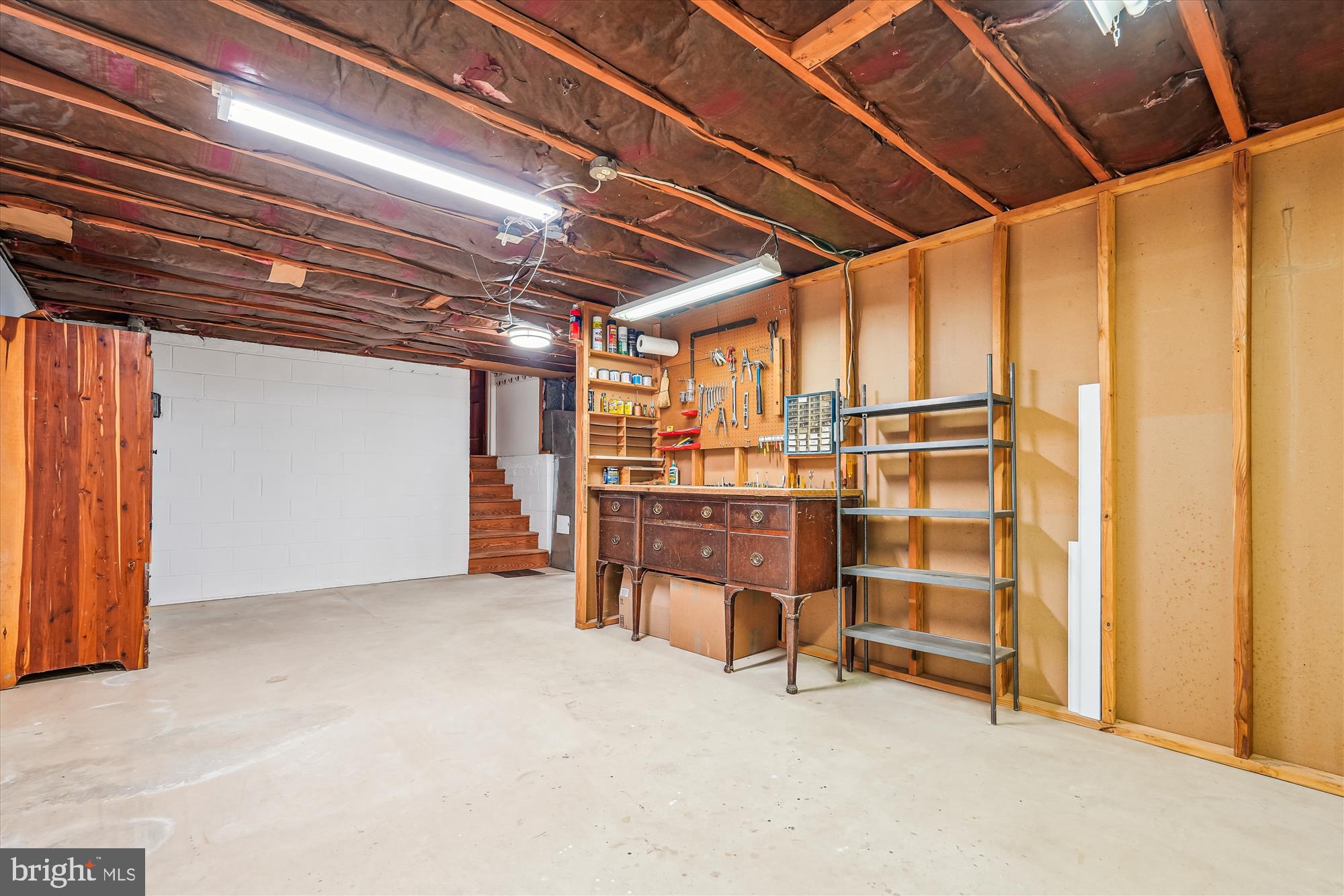 16523 Kipling Road Rockville, MD 20855 - Photo 35 of 50 a view of an empty room with storage