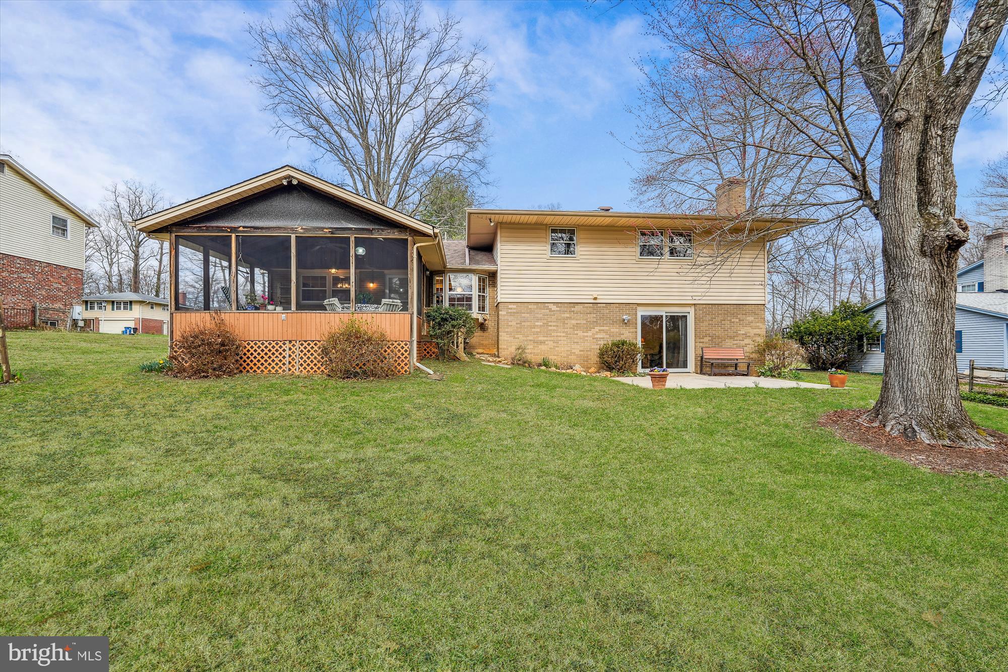 16523 Kipling Road Rockville, MD 20855 - Photo 43 of 50 a front view of a house with a yard and large tree