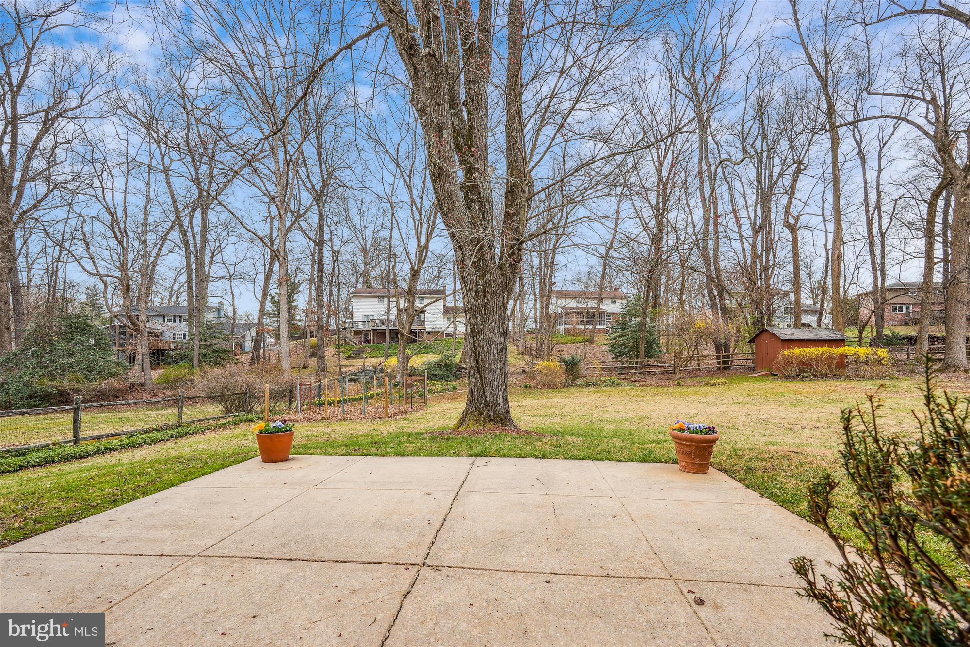 16523 Kipling Road Rockville, MD 20855 - Photo 44 of 50 a street view with large trees