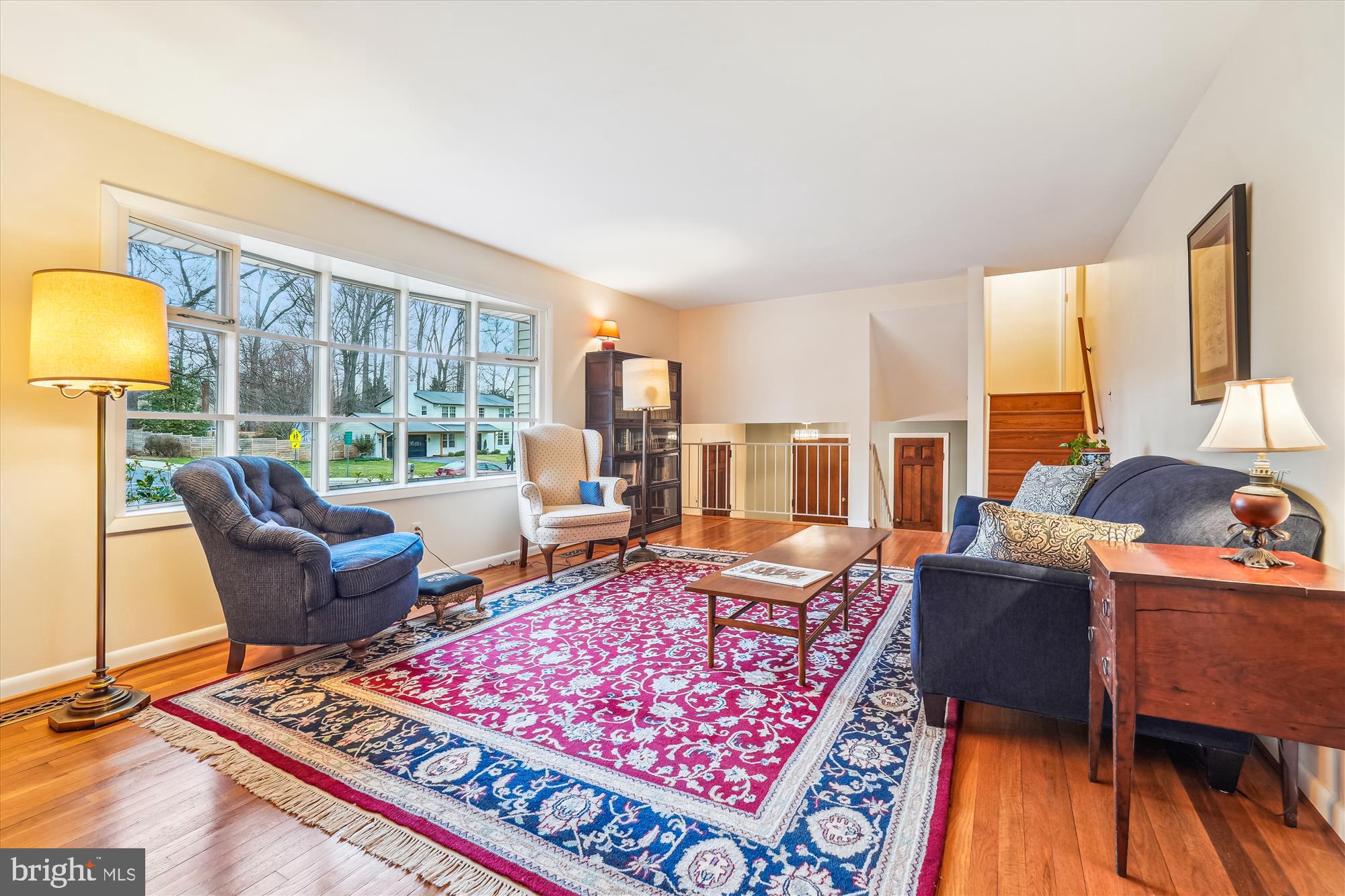 16523 Kipling Road Rockville, MD 20855 - Photo 6 of 50 a living room with furniture and a floor to ceiling window