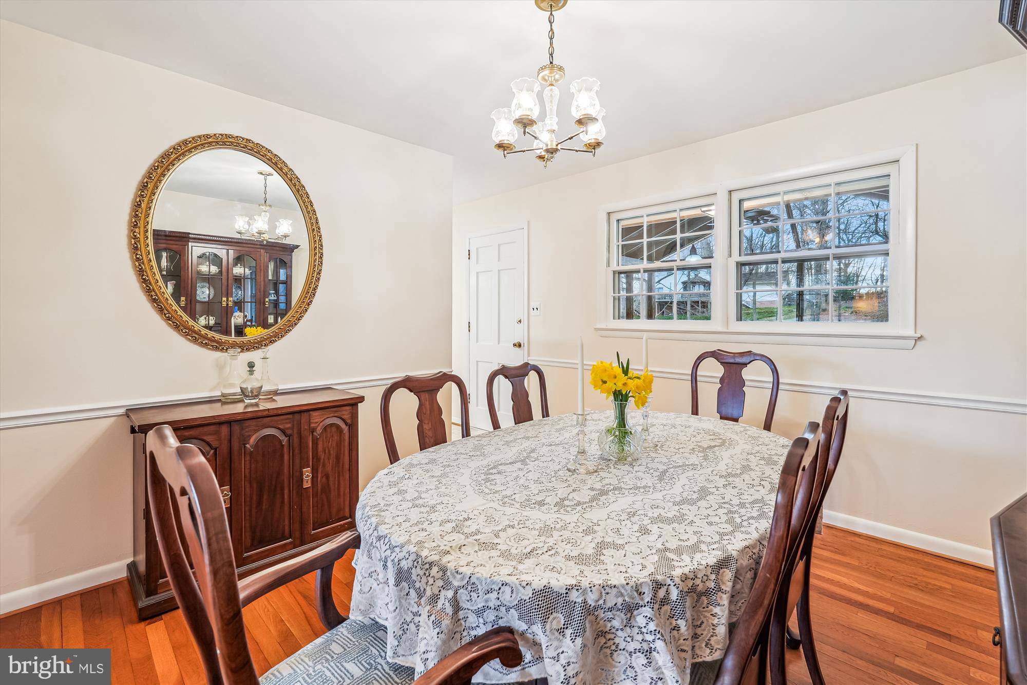 16523 Kipling Road Rockville, MD 20855 - Photo 8 of 50 a view of a dining room with furniture and chandelier