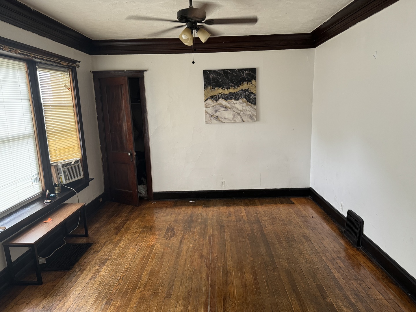 5758 South Honore Street Chicago, IL 60636 - Photo 12 of 57 a view of a room with wooden floor