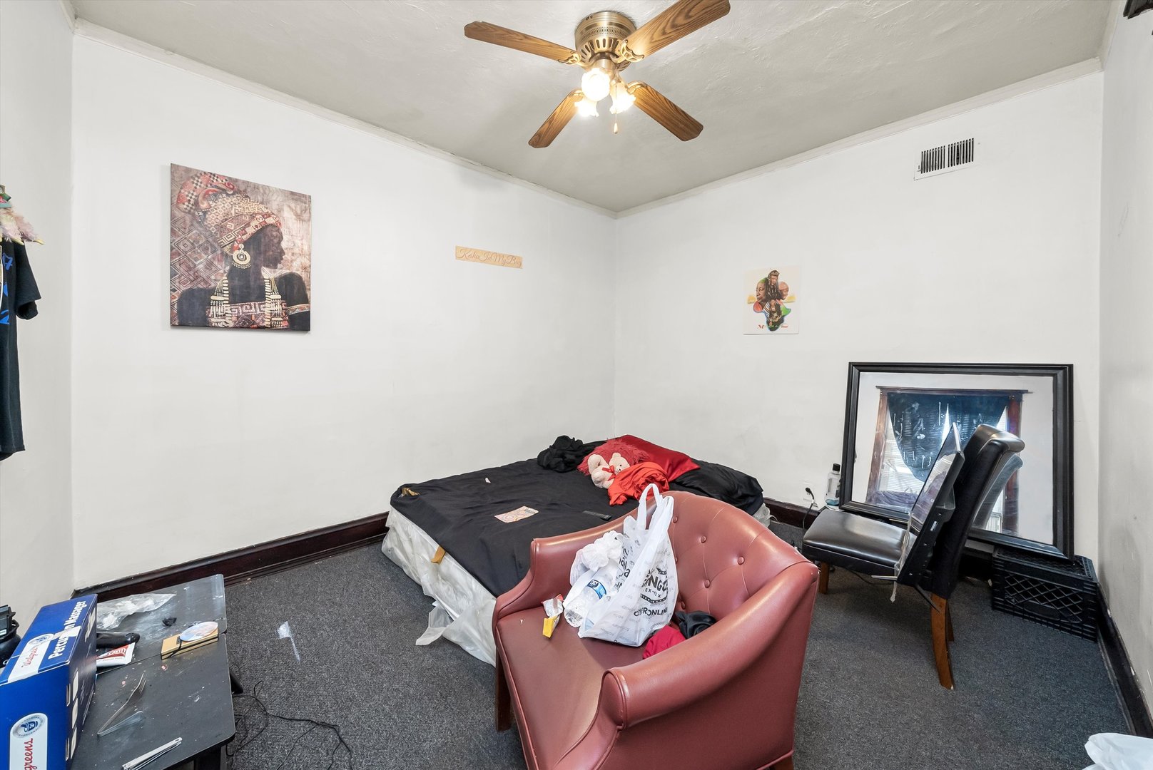 5758 South Honore Street Chicago, IL 60636 - Photo 16 of 57 a living room with furniture and a window