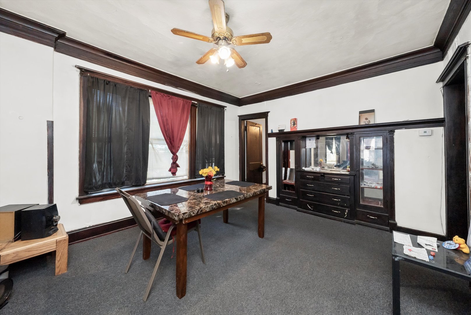 5758 South Honore Street Chicago, IL 60636 - Photo 18 of 57 a living room with furniture a air conditioner and a window