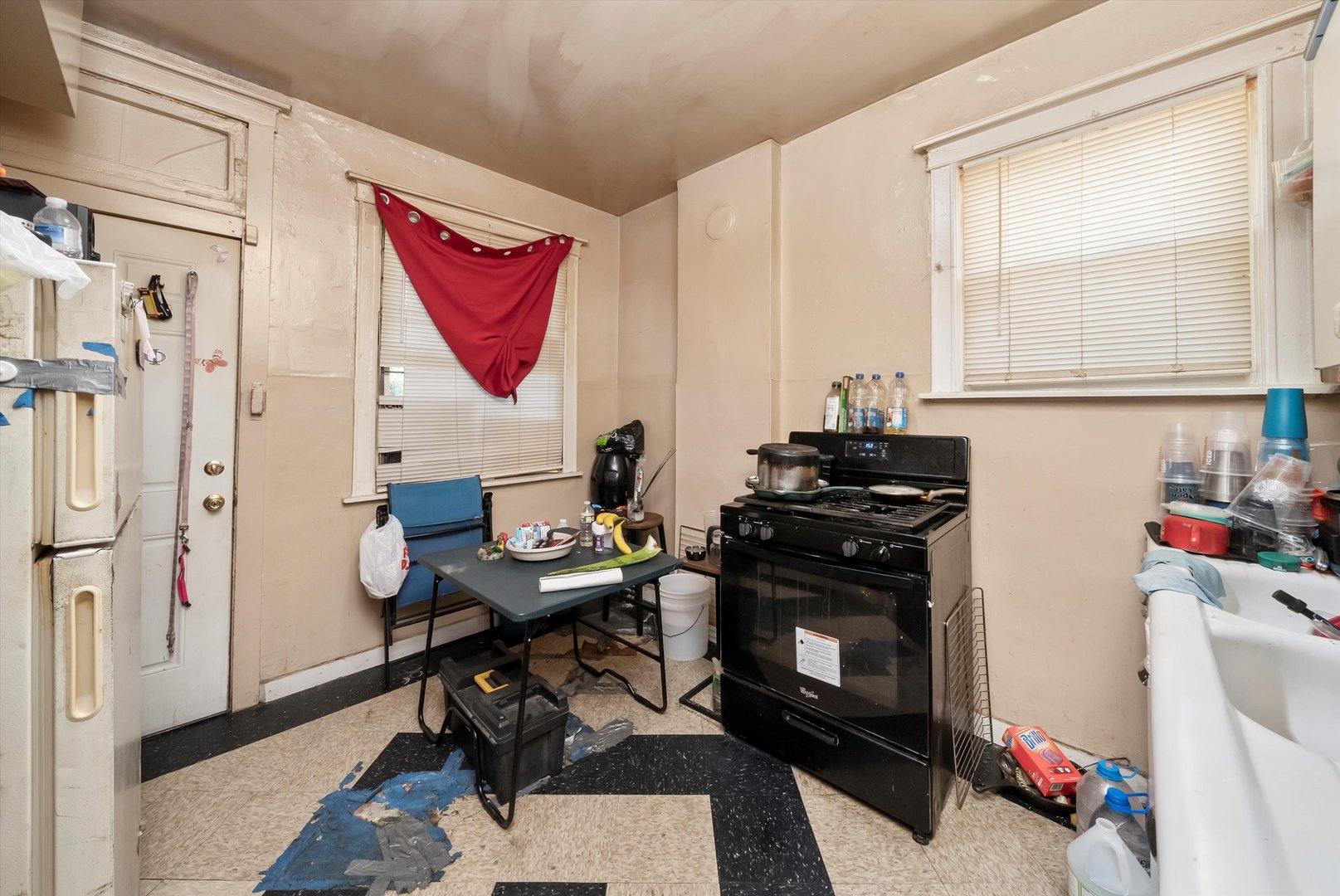 5758 South Honore Street Chicago, IL 60636 - Photo 23 of 57 a view of a workspace with furniture and a window