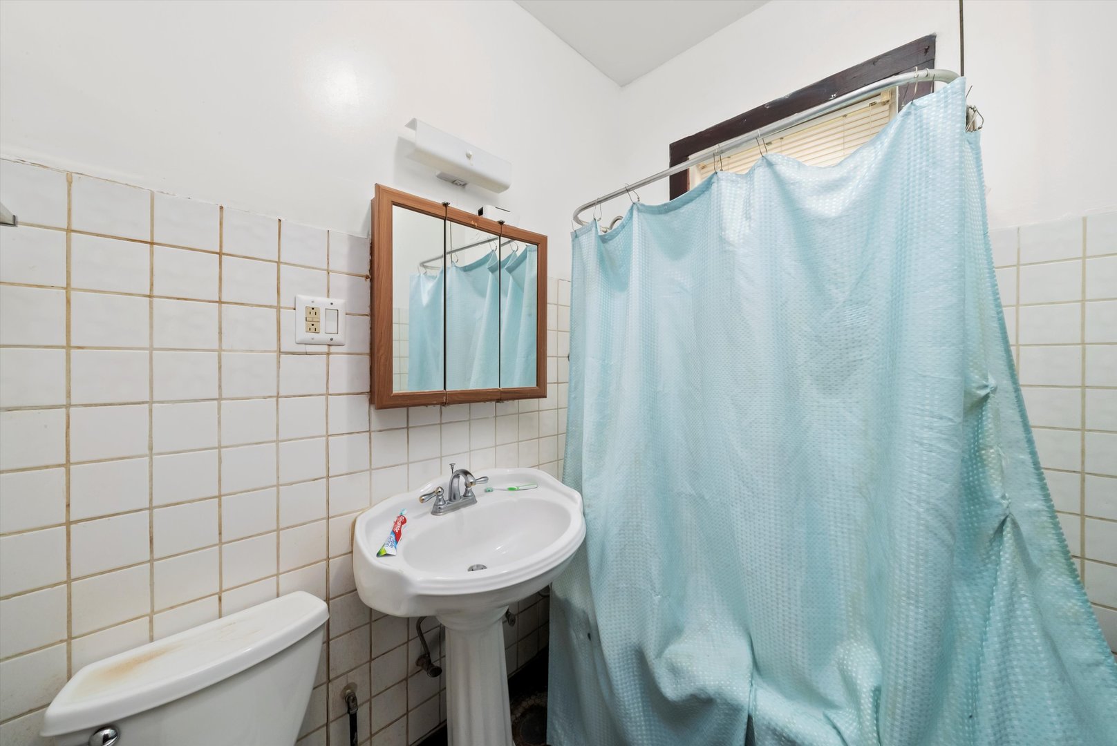 5758 South Honore Street Chicago, IL 60636 - Photo 30 of 57 a bathroom with a sink toilet and shower